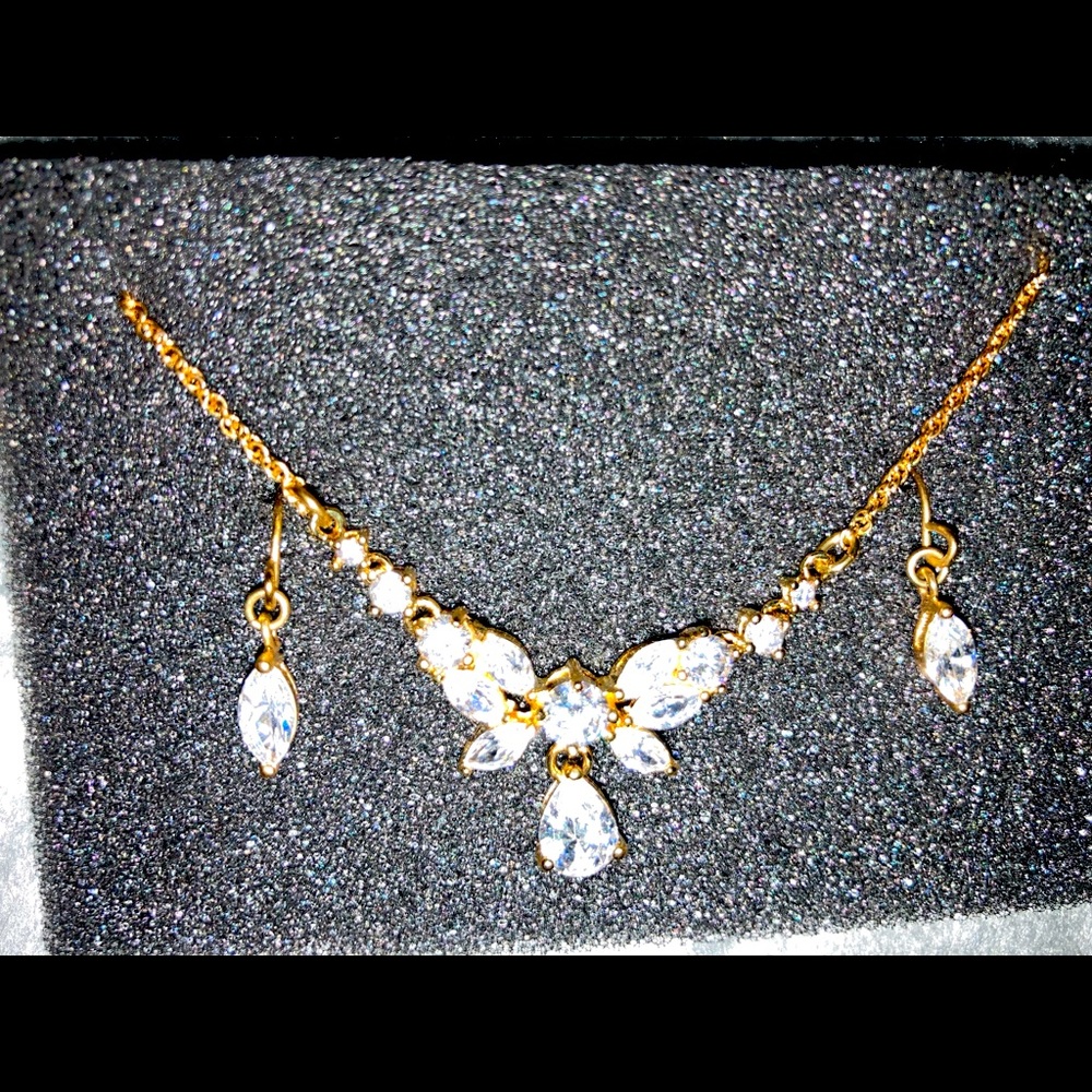 Marquis’s cut diamond necklace with matching earrings
